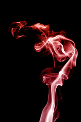 Obraz premium Abstract smoke like a fire, isolated on black background.