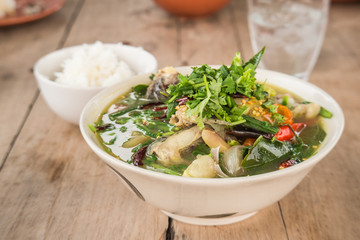 Curry Choy , vegetable Curry , Rice on wooden floor.
