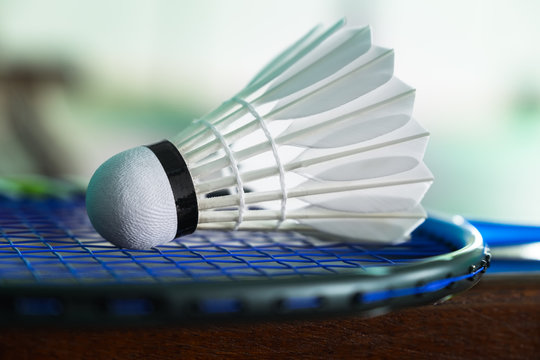 Close up shuttlecocks on a racket for a badminton