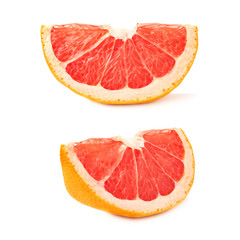 Dried small slice section of grapefruit isolated over the white background