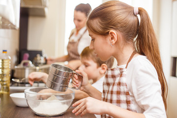 Family cooking background. Children in the kitchen