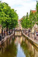 Fototapeta na wymiar Canal in De Wallen district of Amsterdam