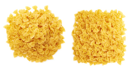 Pile of dry farfalle pasta over isolated white background