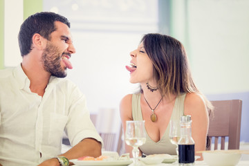 Young romantic couple  have fun at restaurant