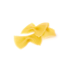 Pile of dry farfalle pasta over isolated white background