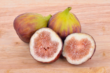 Fresh figs on wooden  background