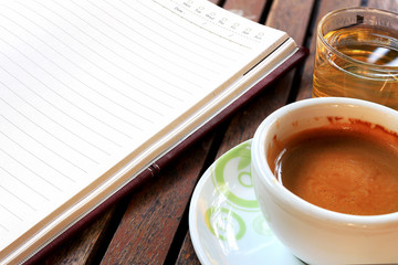 workplace, coffee cup on wooden table [blur and select focus background]