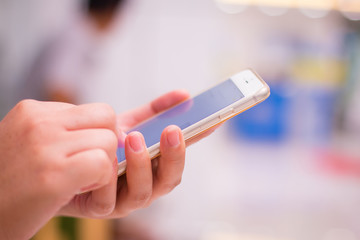 Hand holding and Touch on Smartphone