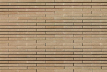 Light brown brick wall background pattern