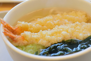 Hot Udon served in white bowl