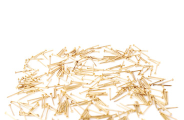 Scattered nails over surface isolated over white background