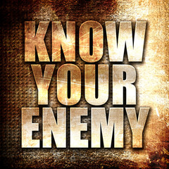 know your enemy, written on vintage metal texture