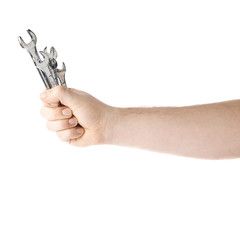 Hand holding a wrench tools, composition isolated over the white background