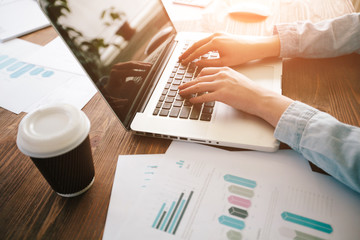 Website designer working at computer laptop