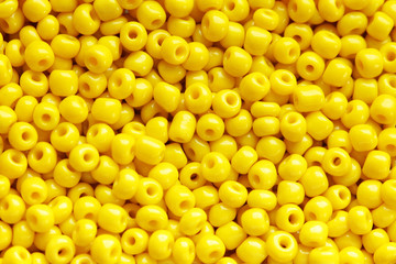 Beads of yellow colour close up macro photo
