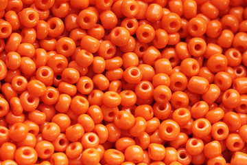 Beads of orange colour close up macro photo