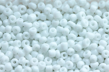 Beads of white colour close up macro photo