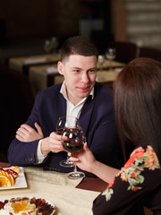 Couple toasting wineglasses