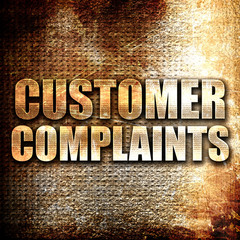 customer complaints, written on vintage metal texture