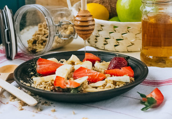 Healthy Breakfast.bowl of cereal with strawberries