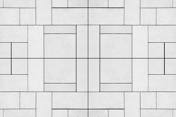 The modern white concrete tile wall background and texture..