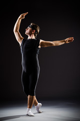 Young man training for ballet dances