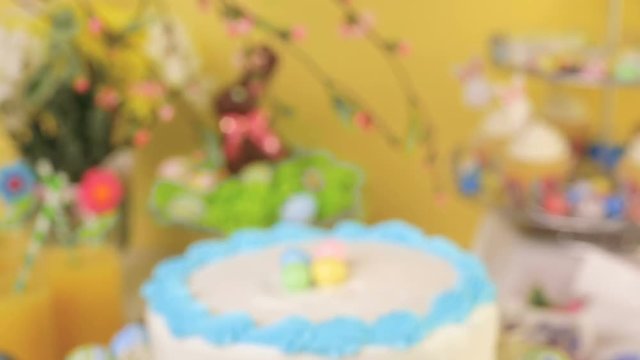Dessert table set with cake and cupcakes for Easter brunch