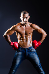 Fototapeta na wymiar Ripped boxer in sports concept