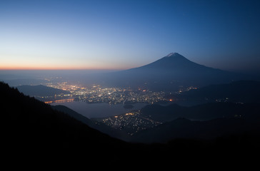 View of Mountain Fuji and Kawaguchiko lake in morning autumn season seen from Shindotoge view point