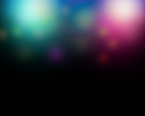 Abstract blurred color lghts background with black copy space.