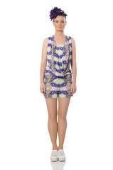 Pretty model wearing purple floral dress isolated on white