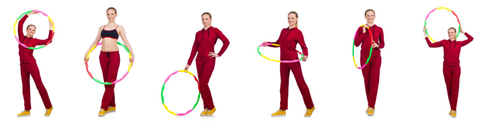 Woman doing exercises with hula hoop