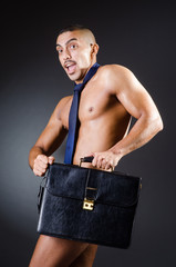 Ripped young man in studio concept