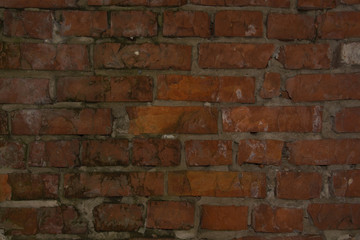 Dark red brick wall background texture horizontal stained grungy