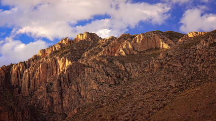 Fototapeta premium Clouds Over The Peaks at Guadalupe Mountains National Park - Tim
