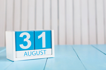 August 31th. Image of august 31 wooden color calendar on blue background. Last Summer day. Empty space for text. Blog Day