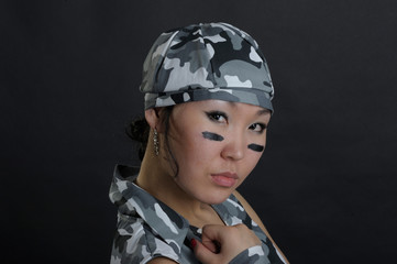 Asian woman in military uniform