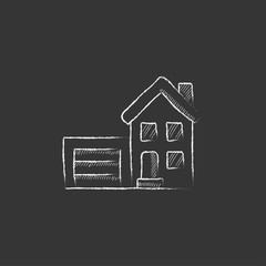 House with garage. Drawn in chalk icon.