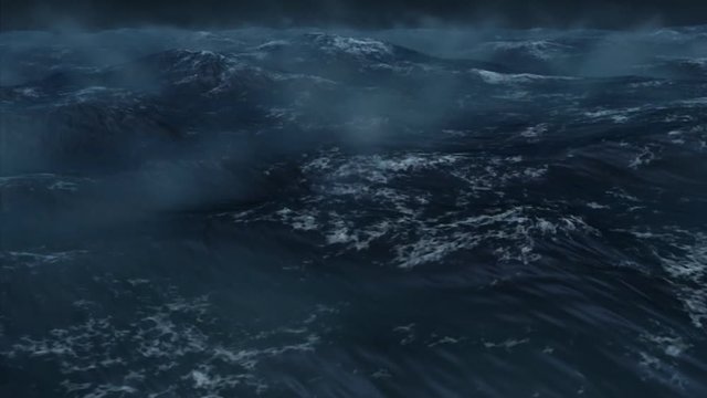 Oceanic 0104: Ocean white caps ripple in a dark misty, stormy night (Loop).