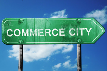 commerce city road sign , worn and damaged look