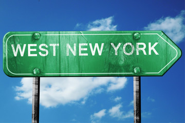 west new york road sign , worn and damaged look