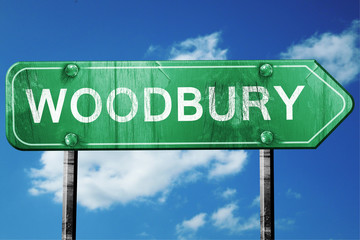 woodbury road sign , worn and damaged look