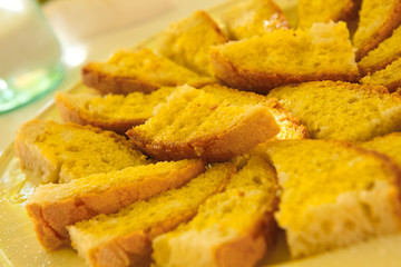 bread on a plate with olive oil