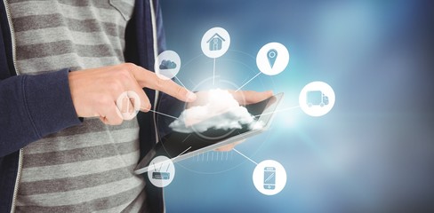 Composite image of cropped image of man using tablet