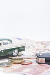 Oldtimer car on Money Underground with a key