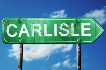 carlisle road sign , worn and damaged look