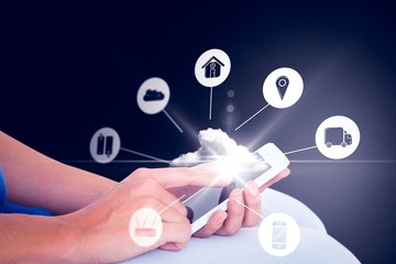 Composite image of woman using mobile phone