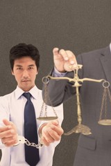 Composite image of male lawyer holding scale and gavel