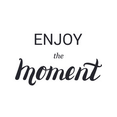 Enjoy the moment lettering calligraphy on brush strokes background. Design for card, poster, shirt print. 