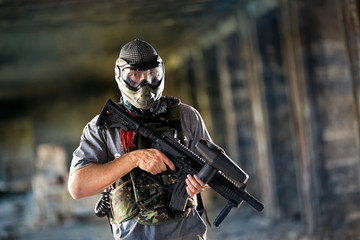 Paintball player with protective mask